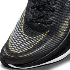 Nike Women's ZoomX Vaporfly Next % 2 Racing Shoe - Black/White/Metallic Gold Coin - Regular (B) 16 Nike Women's ZoomX Vaporfly Next % 2 Racing Shoe - Black/White/Metallic Gold Coin - Regular (B) -Sneaker Store CU4123 001 PHSYD001 1500